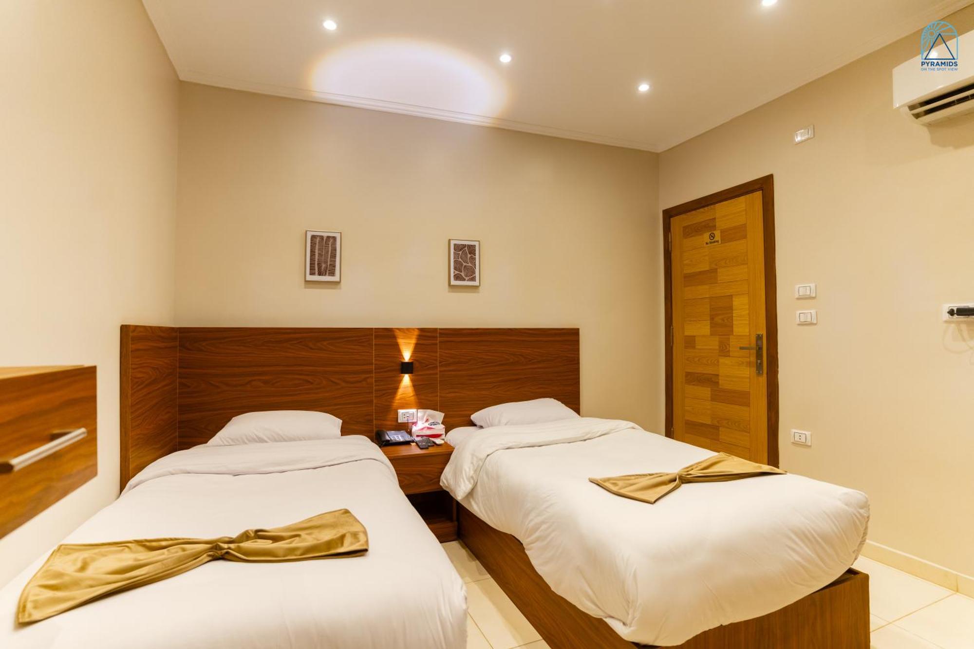 Pyramids On The Spot View Hotel Kafret el-Gabal Екстериор снимка