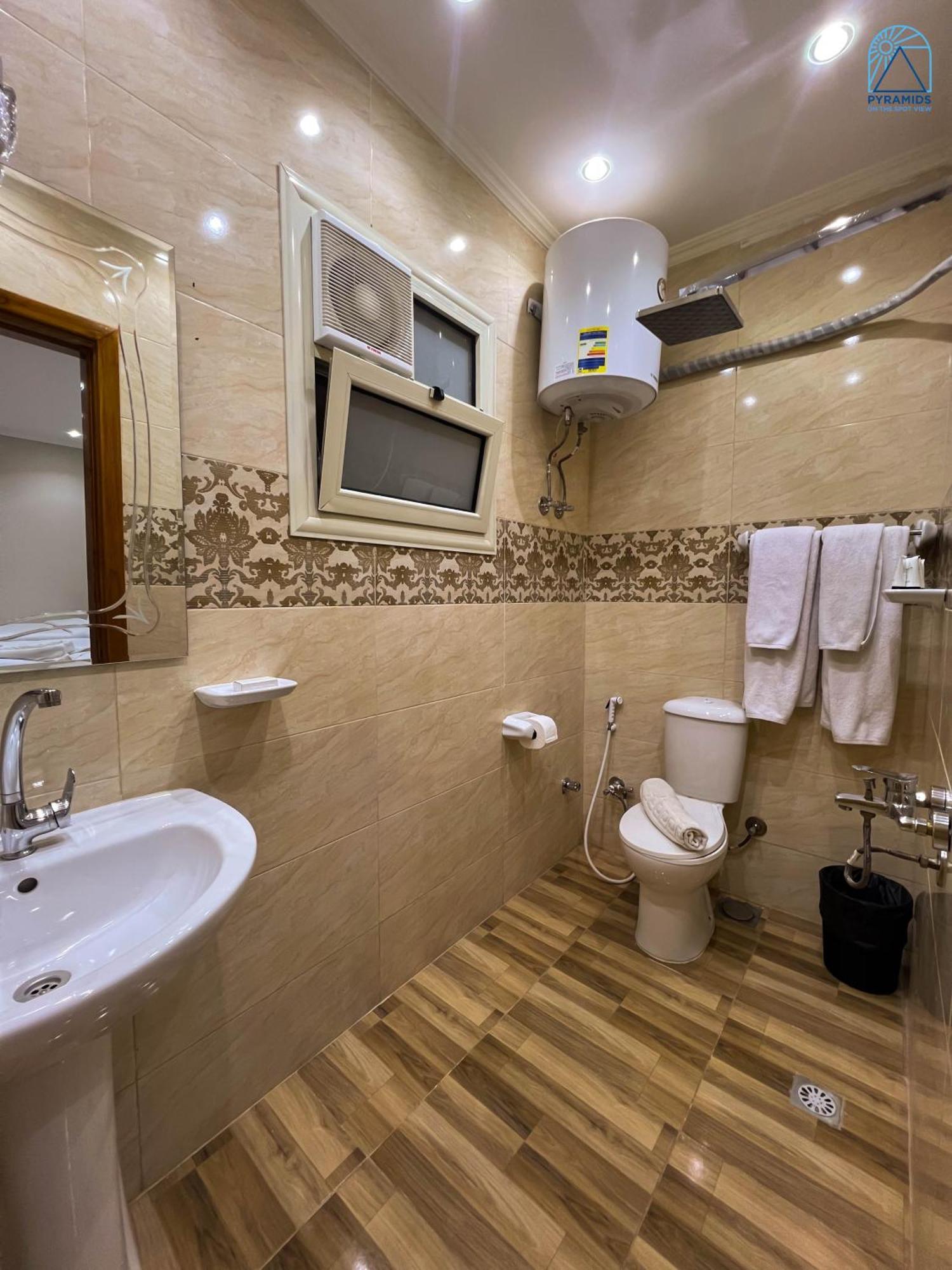 Pyramids On The Spot View Hotel Kafret el-Gabal Екстериор снимка