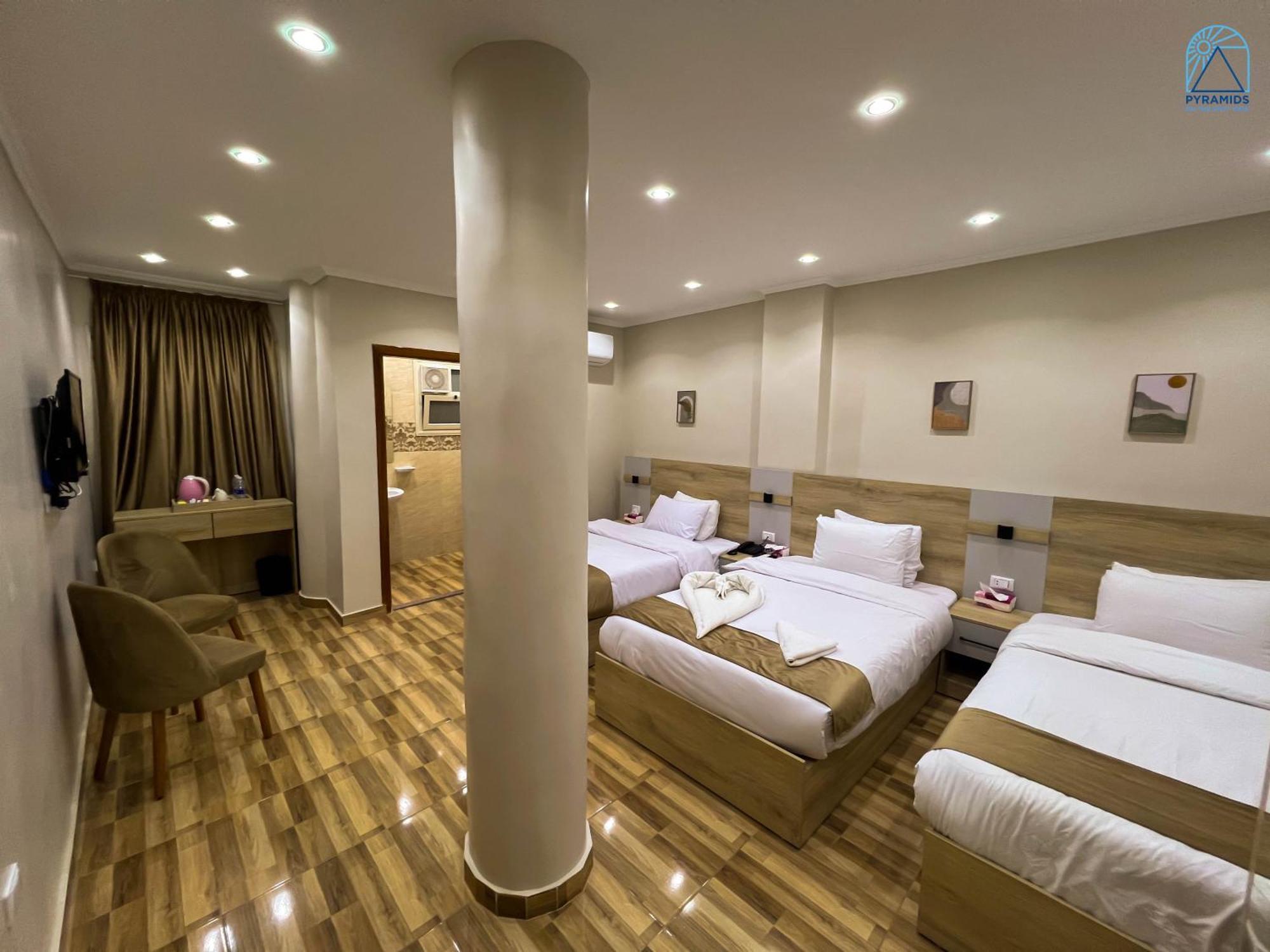 Pyramids On The Spot View Hotel Kafret el-Gabal Екстериор снимка