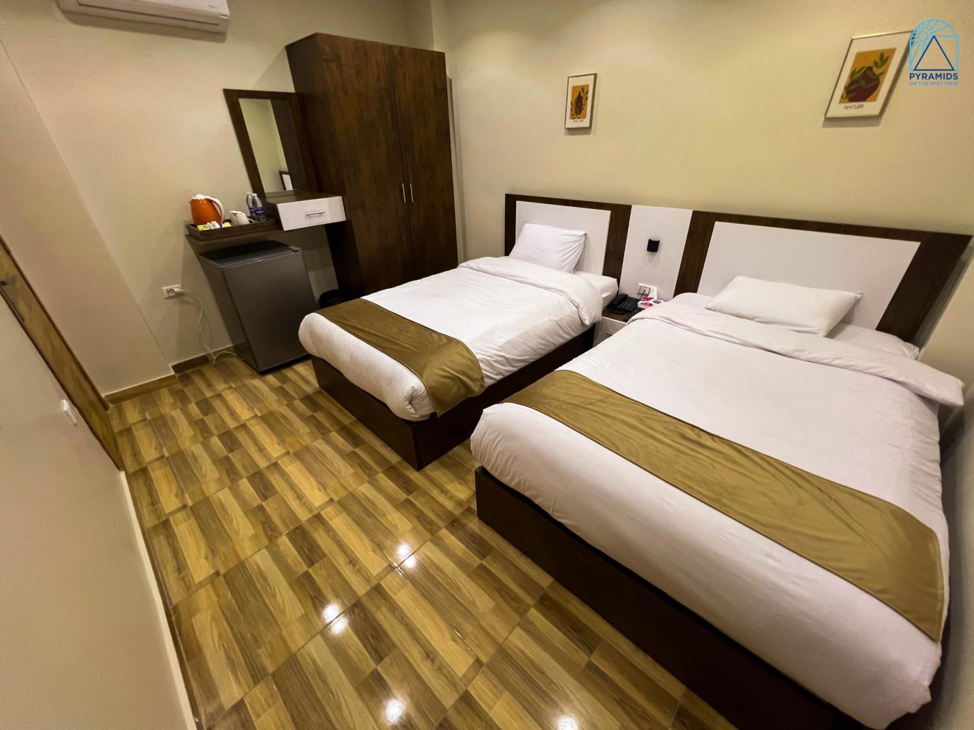 Pyramids On The Spot View Hotel Kafret el-Gabal Екстериор снимка